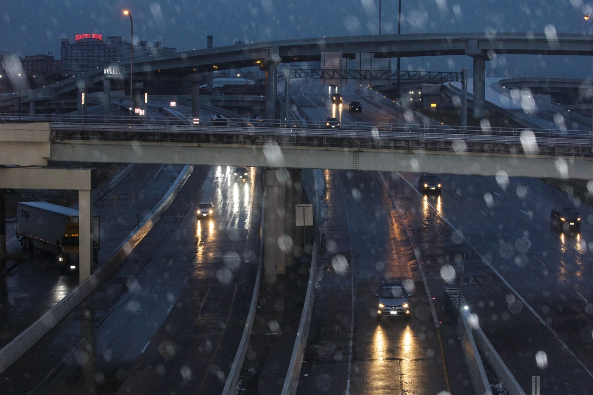 Cars drive down the highways after winter weather went through Dallas on Feb. 2, 2023. Texans can take steps before the weather hits. This guide can help.