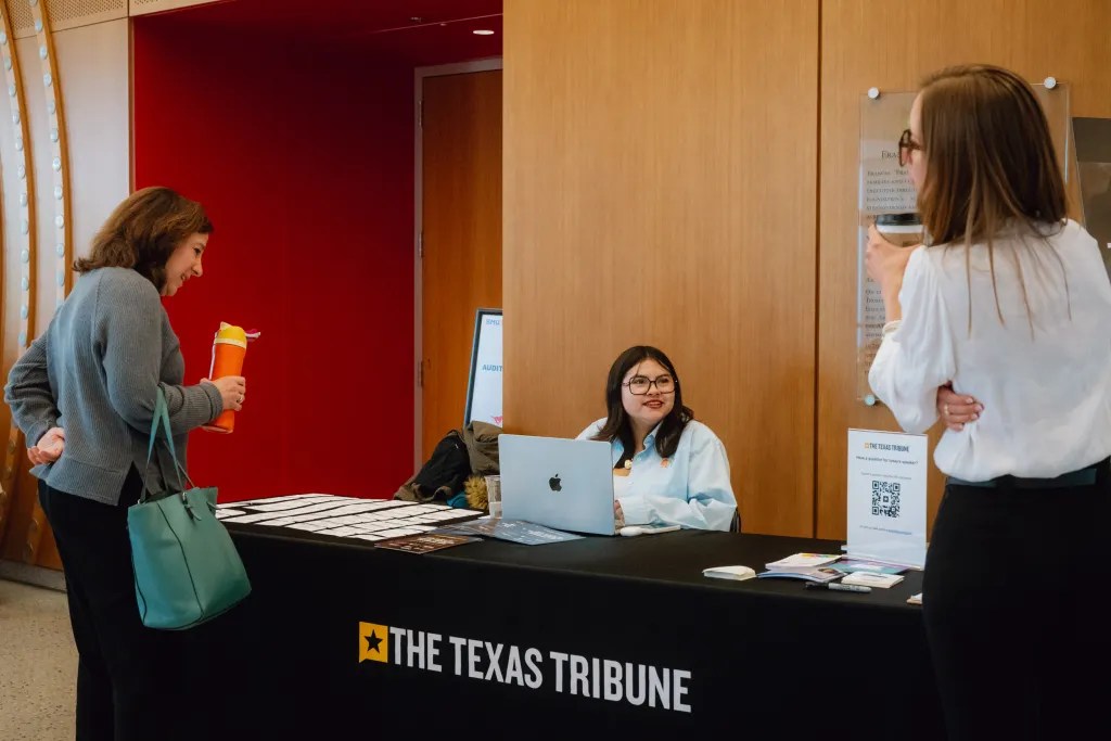 Events fellow Arianna Nevarez registers an attendee for the Religion in Texas Through Journalism symposium at Southern Methodist University in Dallas on April 8, 2025.
