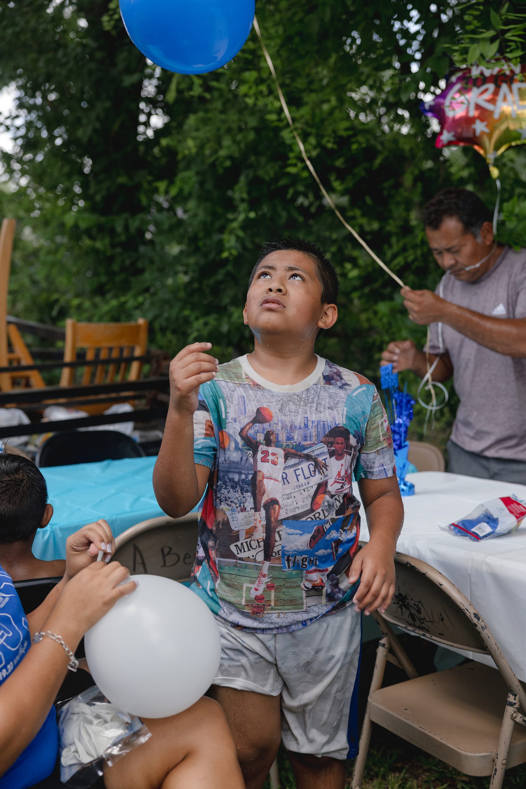 The Avila family celebrates Jeremiah’s birthday with a waterslide in José’s backyard on June 6, 2025. “All I wanted for my birthday this year was to have my mom back home,” Jeremiah wrote in a letter about missing his mother.