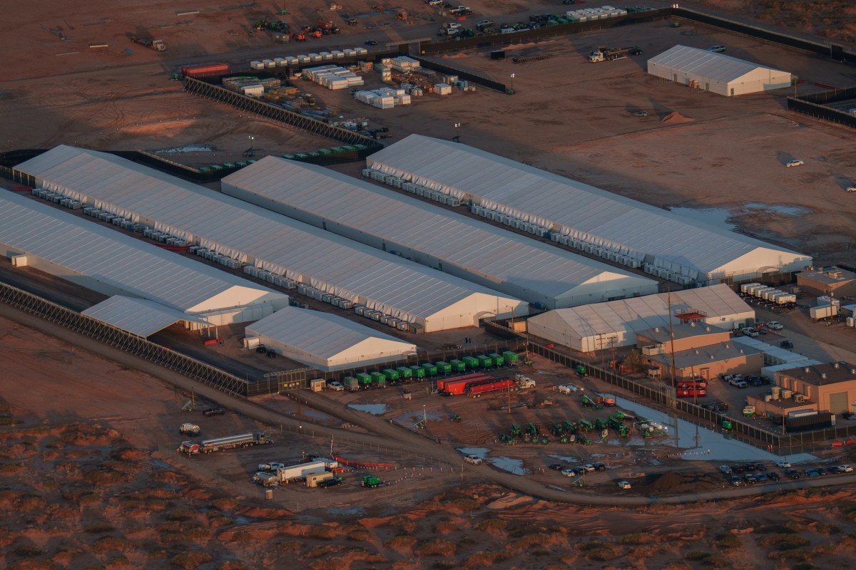 Construction equipment and cars are parked outside of the Camp East Montana, an immigration detention facility, at Fort Bliss in El Paso on Sept. 7, 2025.