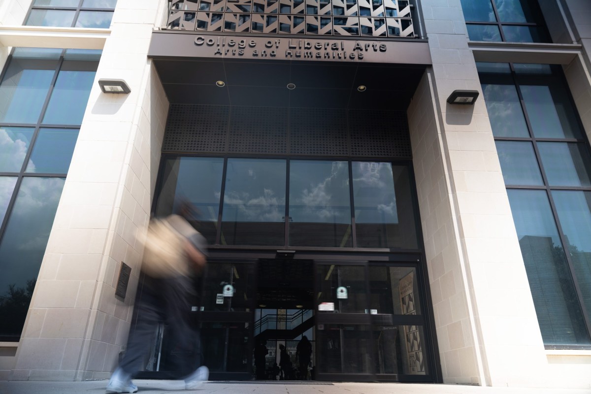 Students walk into the College of Liberal Arts and Social Sciences at Texas A&M University in College Station on Sept. 18, 2025.