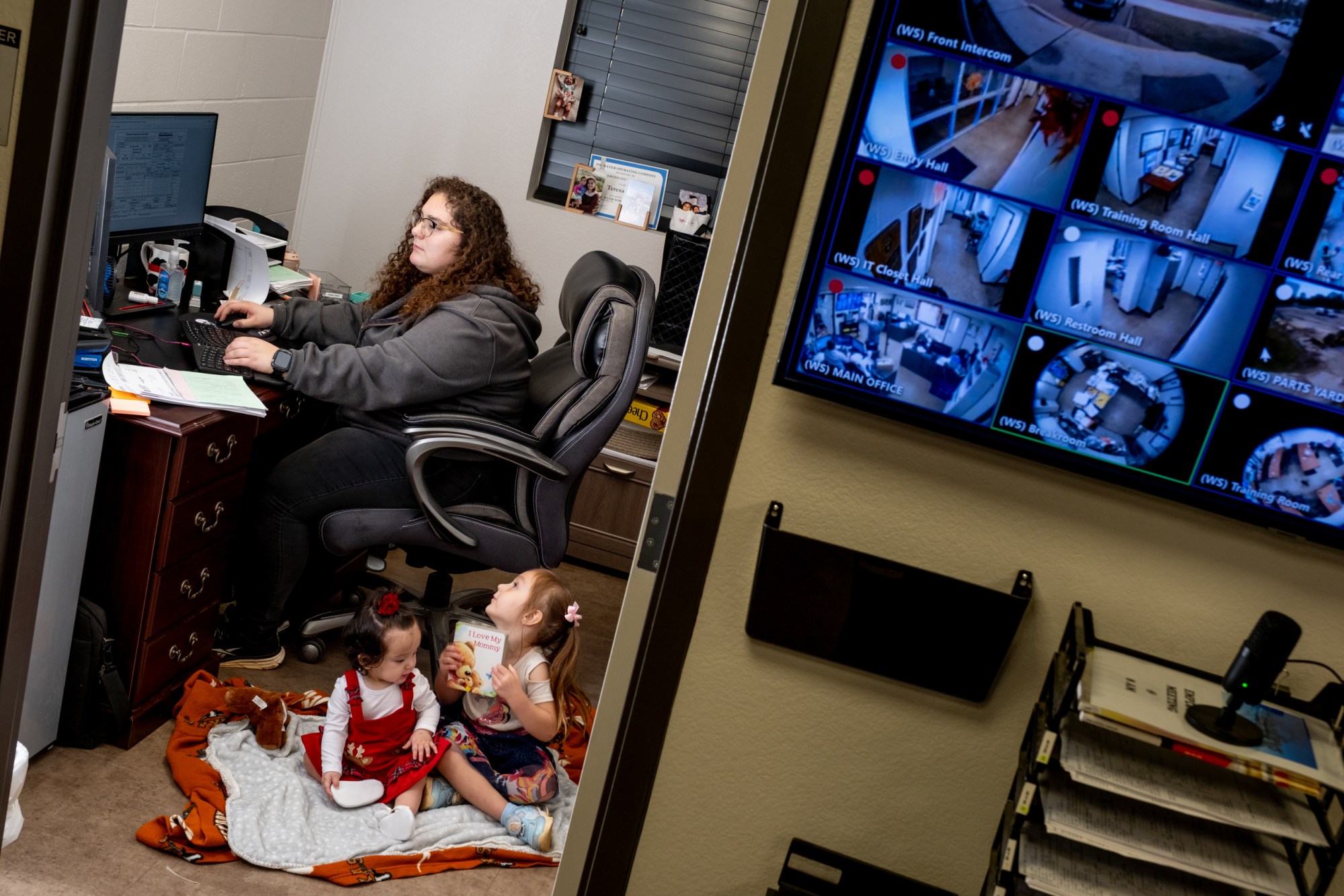 City of Tyler employee Teresa Tudor and her children Cecilia Tudor, 4, and Natalia Hurtado, 8 months, in her office at the Tyler Water Utilities service center on Nov. 21, 2025.