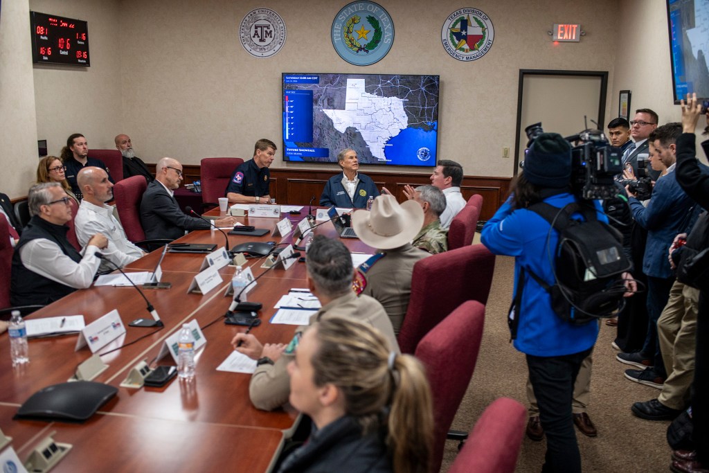 Gov. Greg Abbot is briefed on the incoming winter storm on Thursday, Jan. 22, 2026, in Austin.