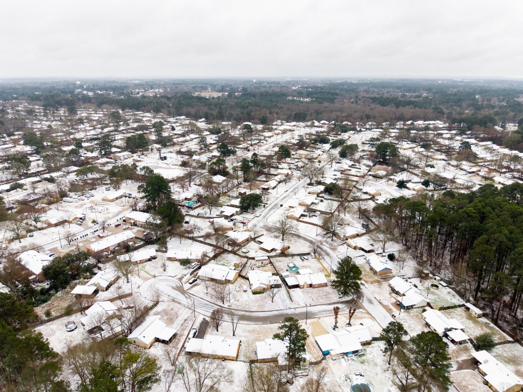 A blanket of ice forms over northwest Longview during the early hours of a winter storm on Saturday, Jan. 24, 2026.