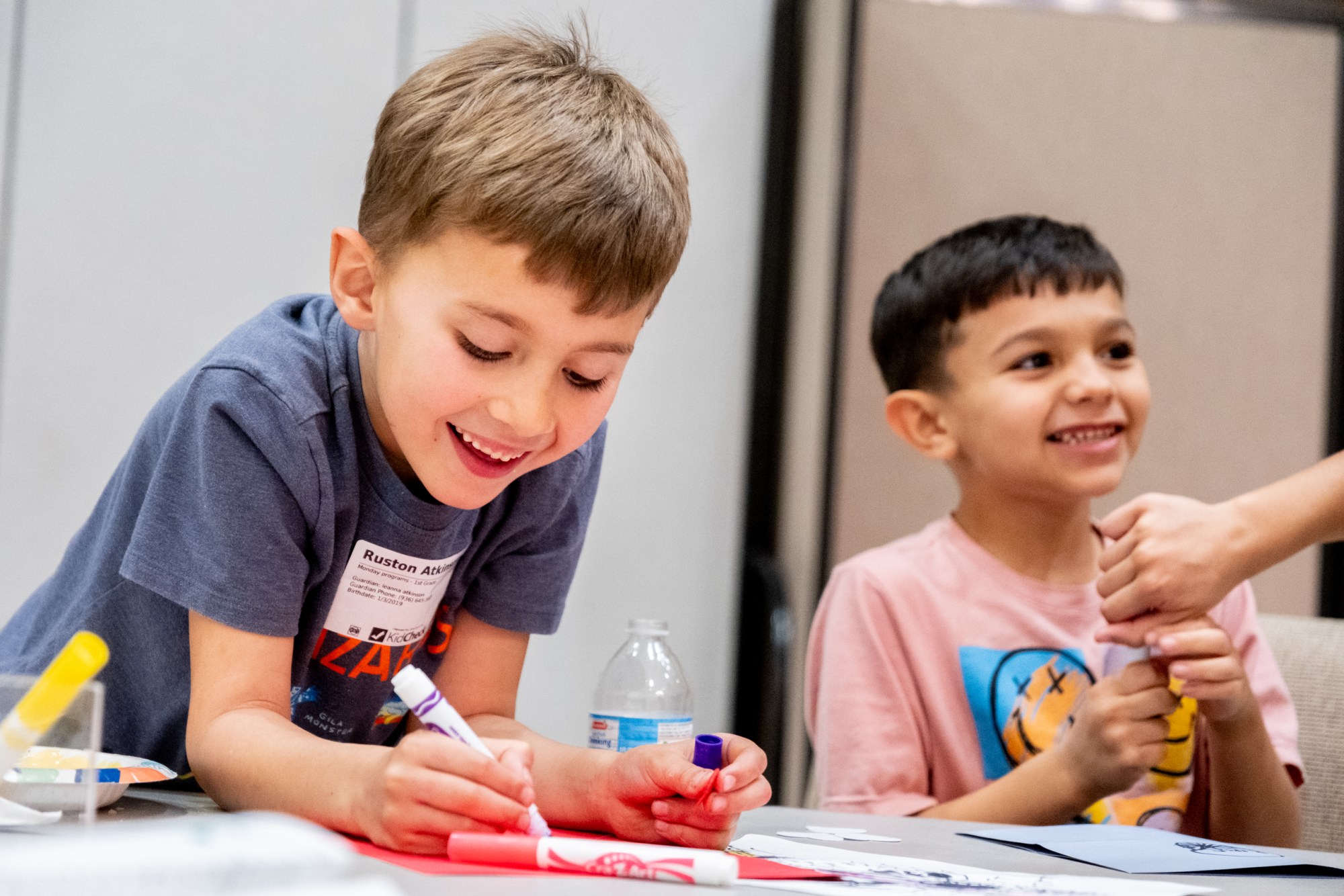 Ruston Atkinson spends his evening making Valentine's cards as his mother attend a SHINE community support group meeting for mothers on Feb. 9, at Marvin Methodist Church in Tyler.