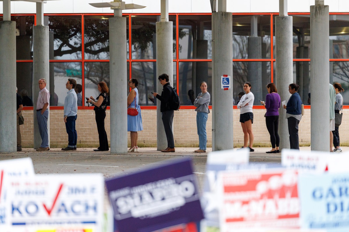 People wait in line to vote outside the Metropolitan Multi-Service Center in Houston on March 3, 2026.